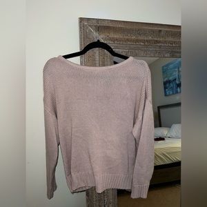 Light pink small shein sweater with open back that ties at the top.